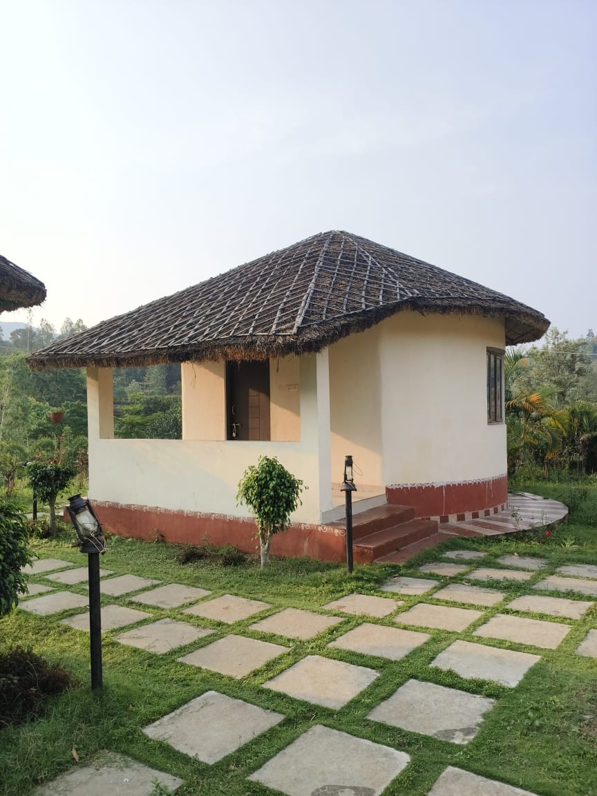 Cottage with hand-painted Dhimsa tribal motifs